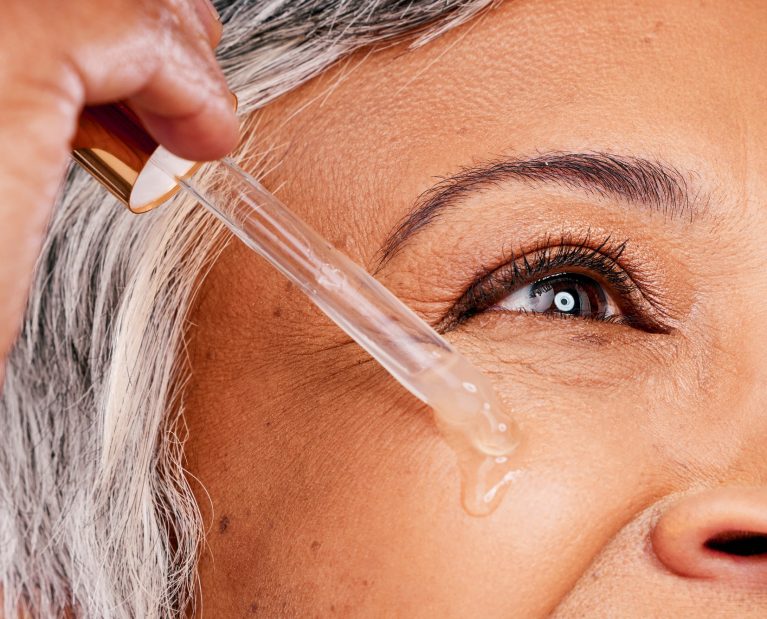 Beauty face, mature woman or serum skincare hydration, anti aging collagen or studio essential oil.