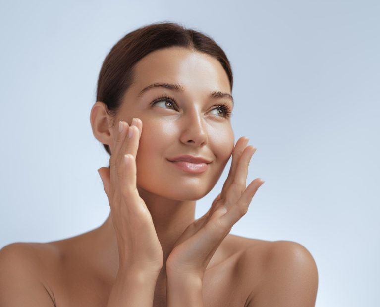 Cosmetics Skin Care Concept Photo of Close-up Woman Perfect Face with Hydrated Skin